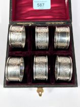 A cased set of 6  hallmarked silver napkin rings, 1.5oz, Birmingham 1935.