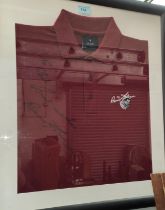 Sir Garfield Sobers, a maroon shirt, signed and with dedication, framed and glazed.