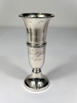 A hallmarked silver posy vase with floral rim and weighted base, inscribed, Birmingham 1975, ht 17cm