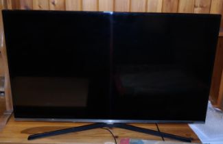 A flat screen Samsung television, 41" and a selection of DVD players similar items