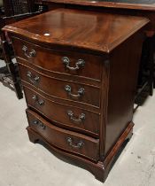 A small mahogany serpentine front chest of drawers