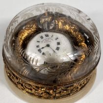 An early 20th century open face keyless silver pocket watch with visible escapement in domed glass