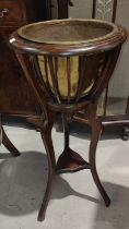An Edwardian mahogany planter with brass bowl; a wall hanging 3 height whatnot