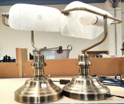 A pair of reproduction brass table/reading lights.