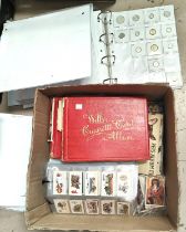Two Wills cigarette card albums a selection of cigarette cards in plastic wallets and plastic