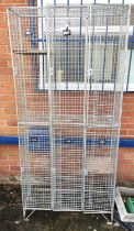 One full height wirework lock units enclosed by 2 doors, one enclosed by 6 doors