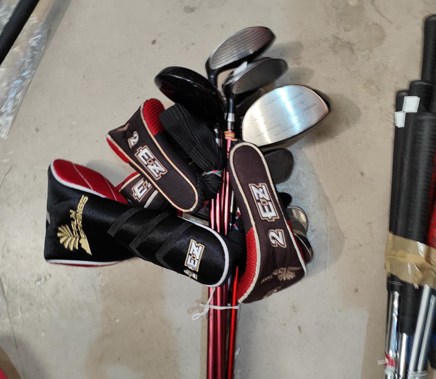 7 modern "King Cobra" golf clubs, 10 "Palm Springs" and other gold clubs.