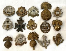 A collection of WWI infantry badges