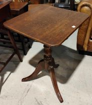 An oak barrel plant stand; a 19th century oak occasional table with square snap top on pedestal base