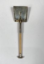 An early 20th century miniature shovel with white metal ends and bone coloured haft, 9.5cm