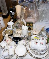 A 6 setting part tea set by Royal Imperial; an "Atlas China" 15 piece miniature tea set;