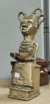 A Benin bronze style figure holding a bowl of food, ht.32cm