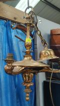 A mid 20th century brass pendant light fitting of 3 branches