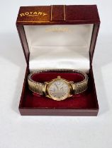 A Rotary quartz gents wristwatch on an expanding strap; a lady's gold plated Rotary wristwatch