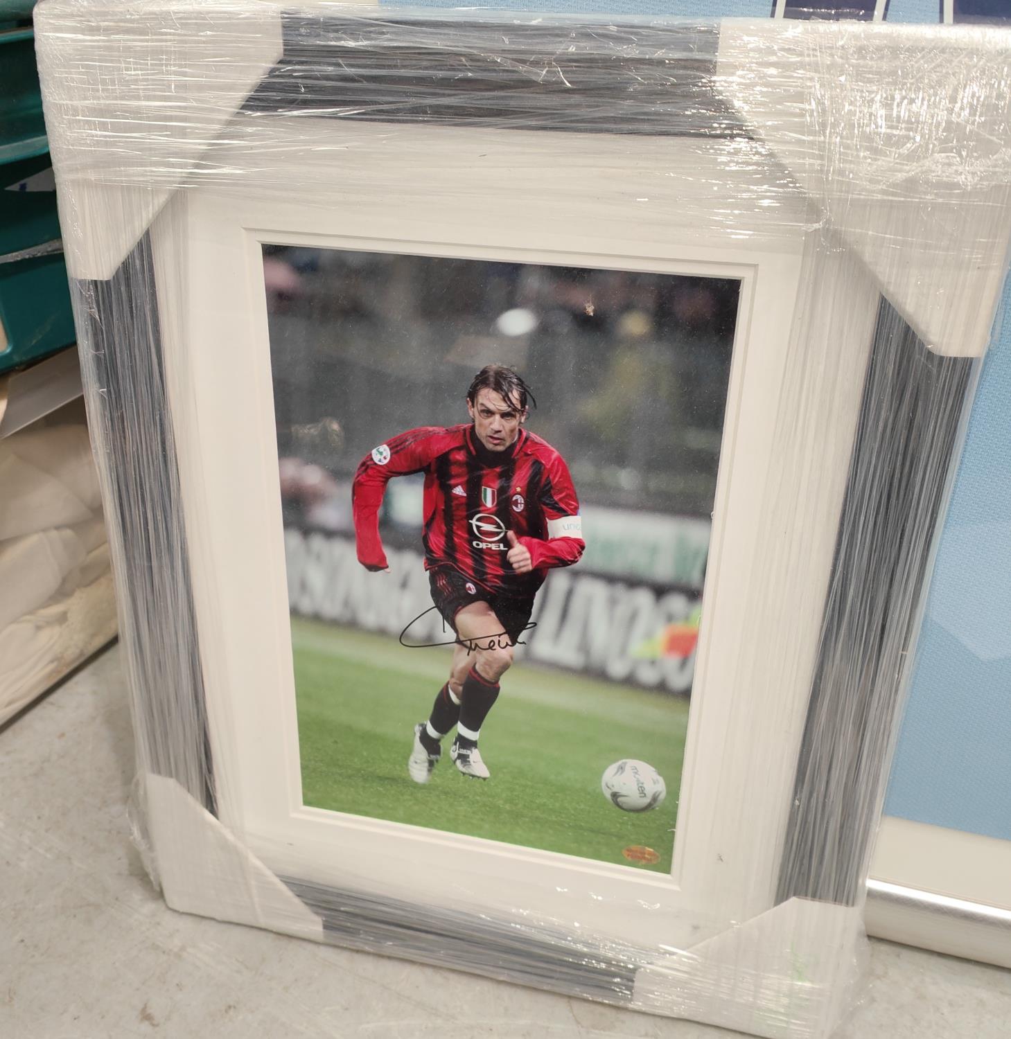 A signed AC Milan shirt framed with picture and certificate