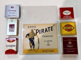 A 2000 Pirate Cigarettes advertising sign; a selection of vintage cigarette packets; etc.