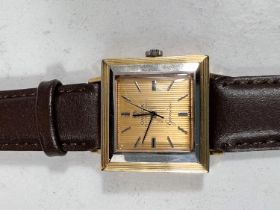 OMEGA: a c.1960 unusual Omega Geneve automatic wristwatch with square 18ct 2 tone gold case (marks