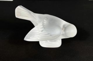 A Lalique frosted glass figure of a finch, signed in script, length 11cm (chip to tail)