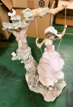 A large Lladro group:  girl on swing, height 43cm