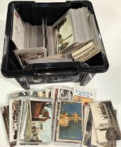 A large selection of postcards:  Edwardian; cartoon; scenic; etc.