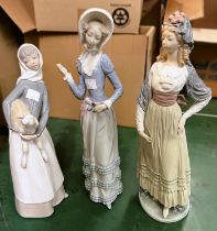 Three Lladro figures;  woman with mantilla, height 32cm; girl in bonnet (a.f.); girl with lamb