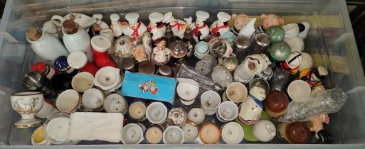 A large selection of egg cruets ceramic some novelty examples