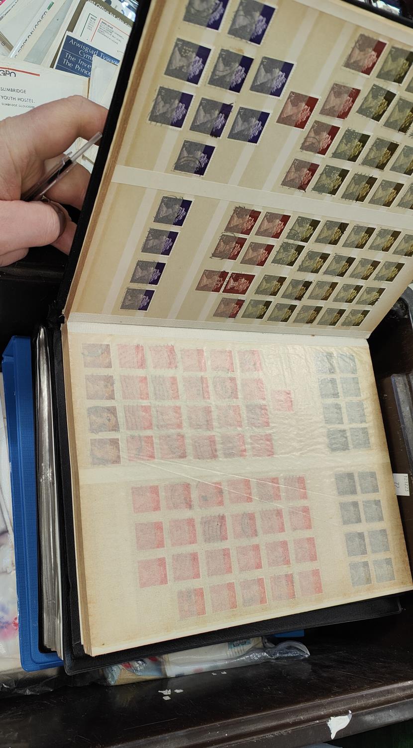 GB: a collection of GB including mint, commemorative stamps in packers, FDC's; a vintage stamp album