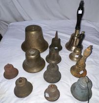 A collection of hand bells; other bells