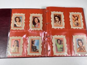 An album of early 20th century onwards film/entertainment cards:  Paper stock cards in frame Star