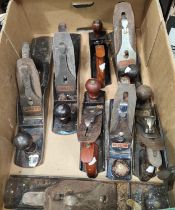 A selection of 8 Stanley and similar wood planes