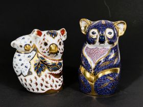 Two Royal Crown Derby koalas, and koala with baby, height 12 & 11cm