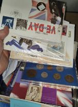 A selection of modern commemorative coins etc in original envelopes, display packaging etc