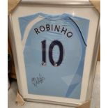 A singed Manchester City Robinho framed shirt with certificate to back