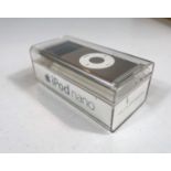 An Apple Ipod NANO 4GB in original case