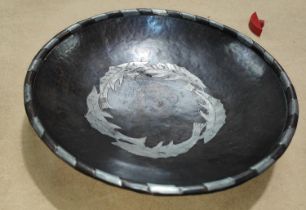 An Arts & Crafts plannished fruit bowl by Hugh Wallace, with pewter inlaid decoration, dia. 21cm