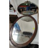 A beaded oak wall mirror and a metal frame wall mirror
