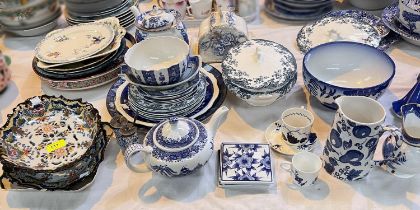 A large selection of blue & white and other plates; dishes; etc.