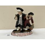 A 19th century Staffordshire group. The Drunken Parson and his Clerk. 8¼' high