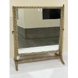 A foliate painted dressing table mirror. 20' wide. Repaired