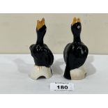 A pair of Newport (Clarice Cliff) blackbird pie funnels. (One repaired)