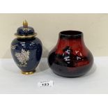 A Royal Doulton 'Flambe' vase, 4¼' high and a Carlton Ware jar and cover, 5¾' high