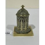 A 19th century brass Go-to-Bed or pyrogen, modelled as a temple with domed cover. 4½' high