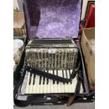 A Hohner Student IV piano accordian