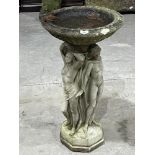 A statuary birdbath, the base moulded as the Three Graces after Canova. 30' high