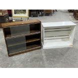 A painted pine shoe rack and a glazed bookcase