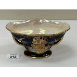 A Crown Devon Fieldings bowl with lustre interior, gilded and painted with a galleon on a cobalt