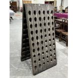 An oak wine rack for 120 bottles. 60' Hinges A.F.