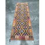 A Choli Kilim carpet runner. 2.47m x 0.83m