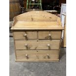 A Victorian pine chest with gallery top over two short and two long drawers on plinth support. 36'