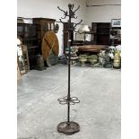 A Victorian cast iron hat and coat stand. 73' high